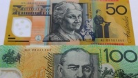 Úc tiếp tục hạ lãi suất cơ bản xuống mức thấp kỷ lục mới
